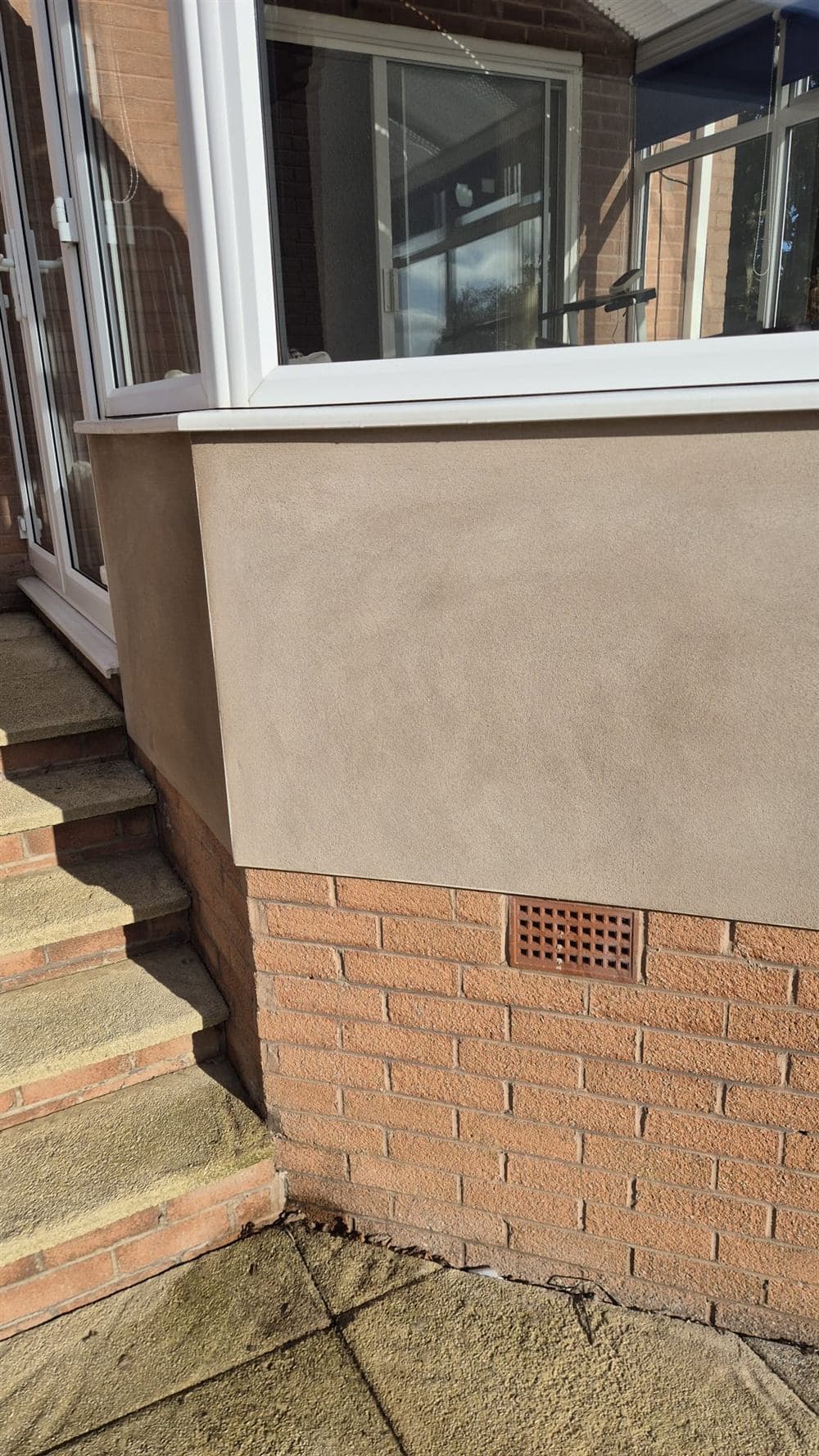 Render repair work on an estate property in Dronfield by G Lee Plastering